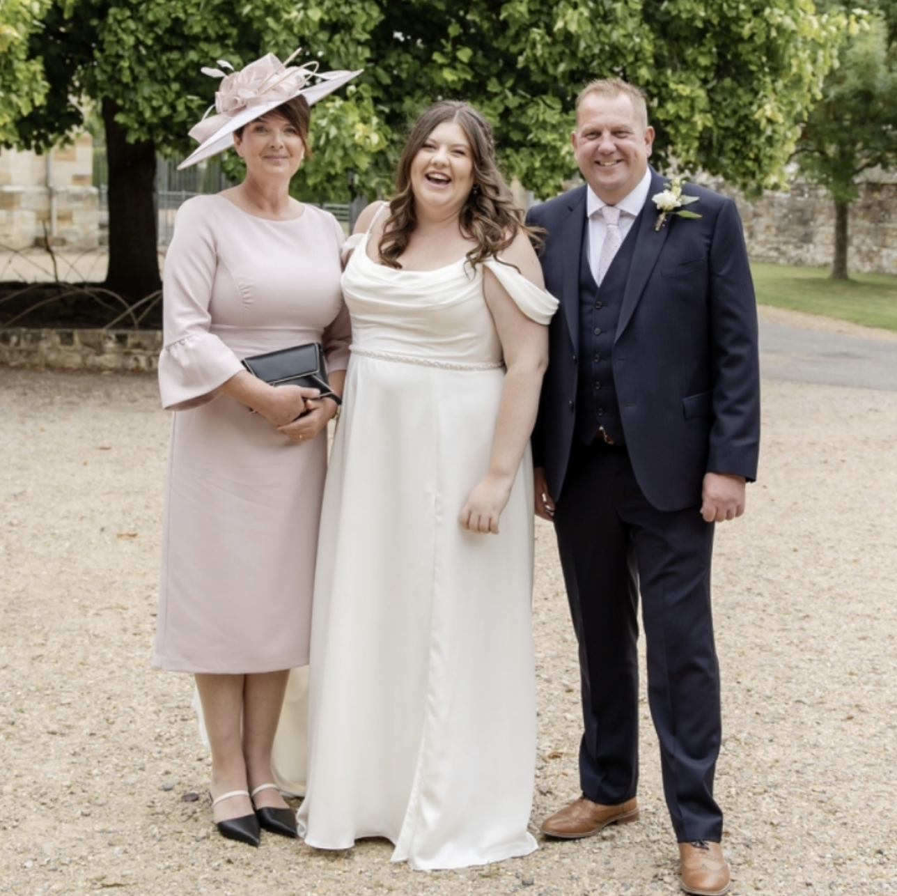 three people at a wedding 