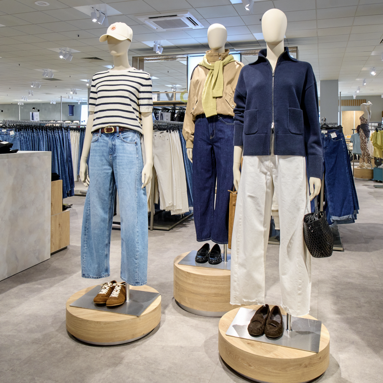 three mannequins wearing M&S women's clothing 