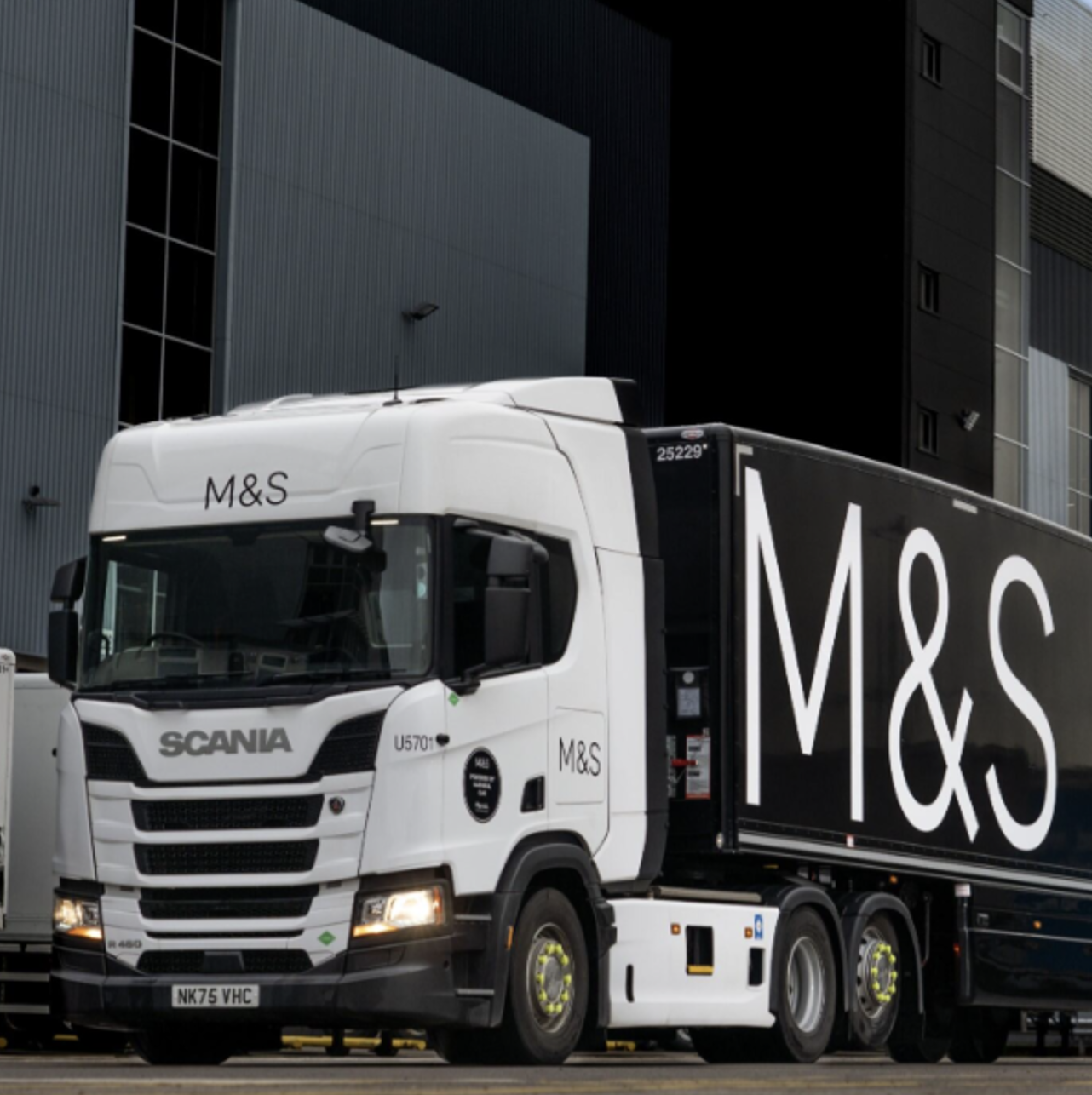 a lorry with M&S printed on the side