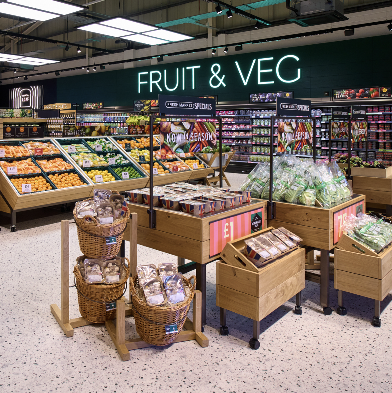 a supermarket with fruit and veg aisle