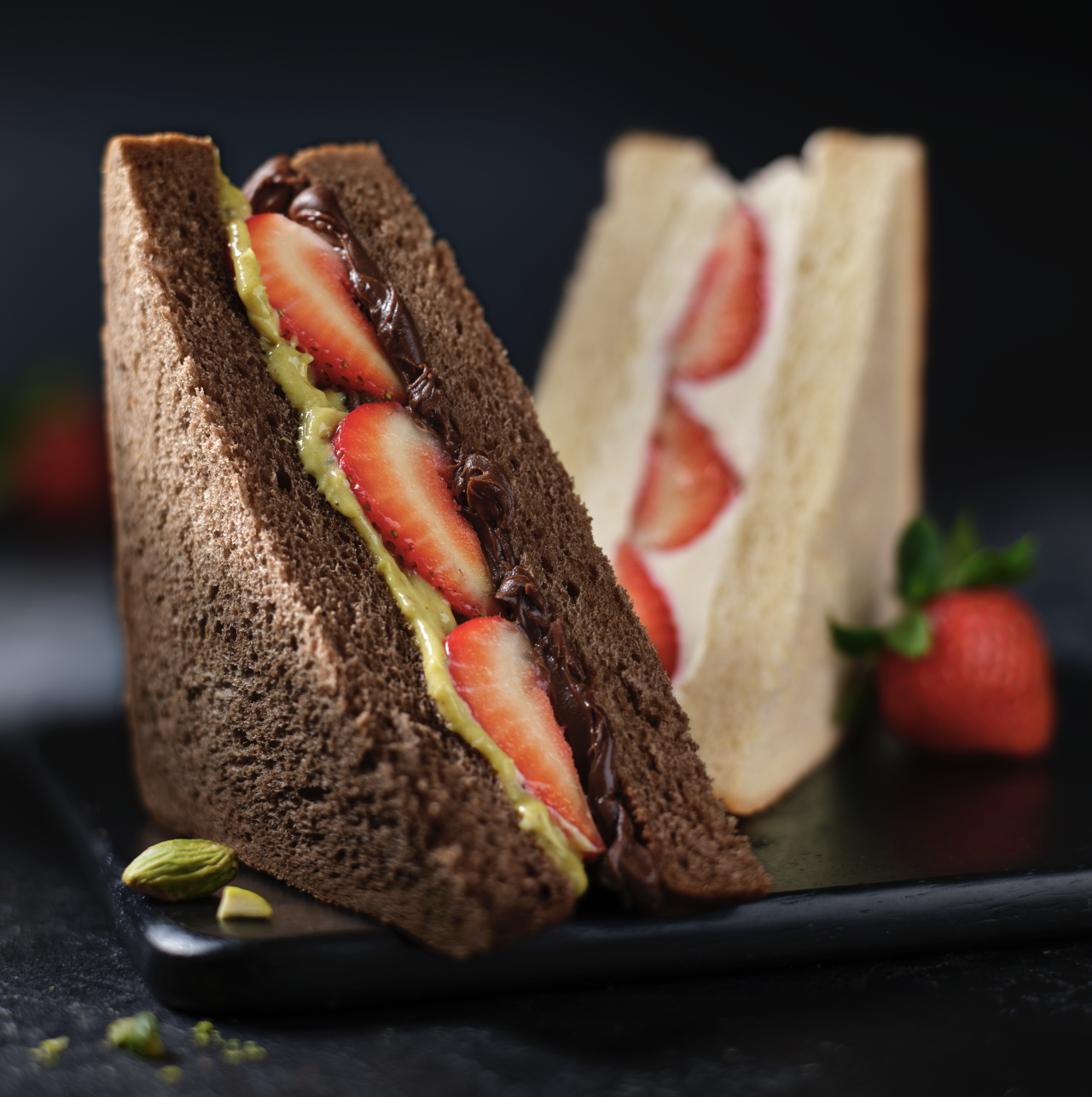 two strawberry and creme sandwiches