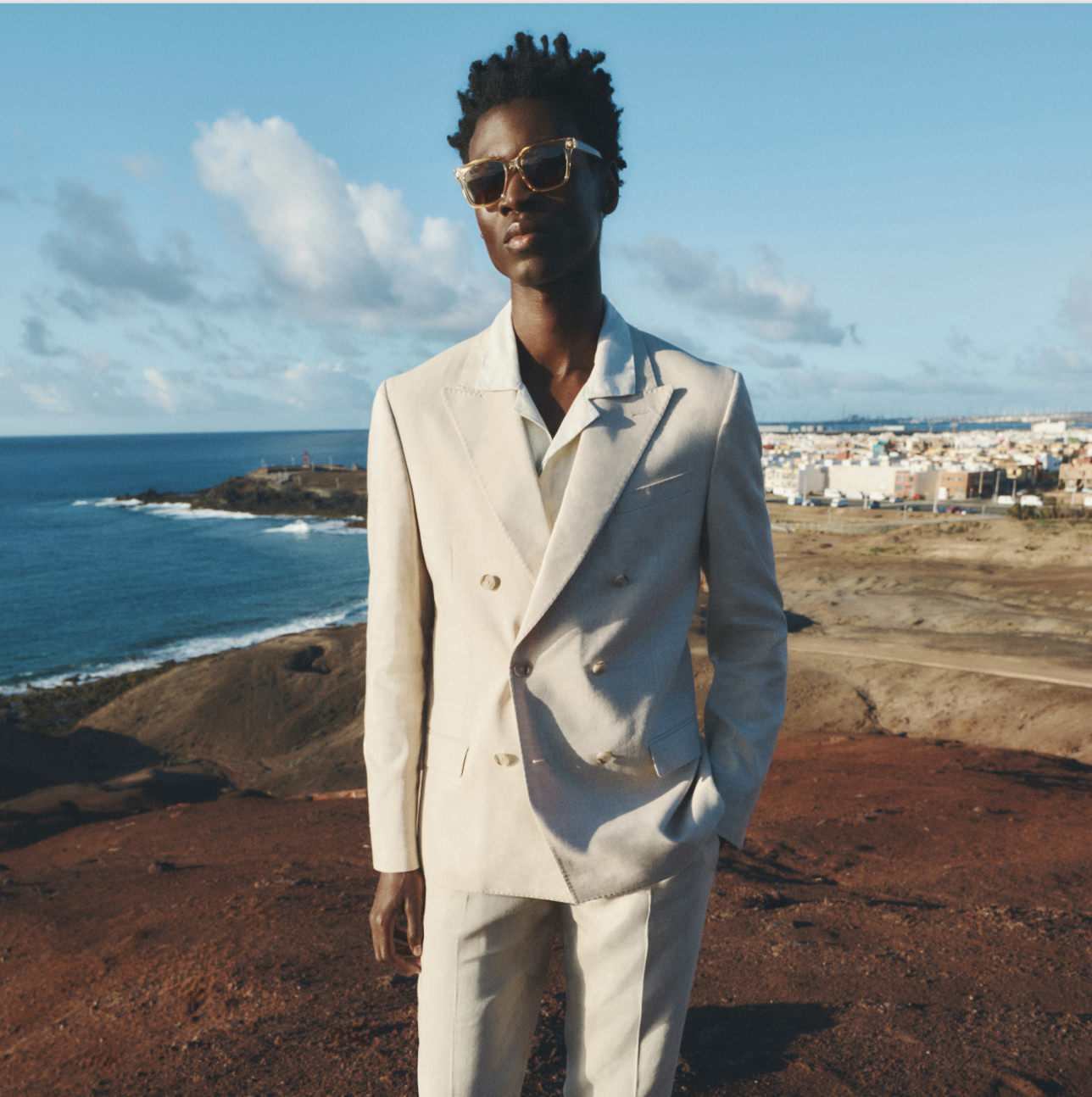 A man standing on a cliff