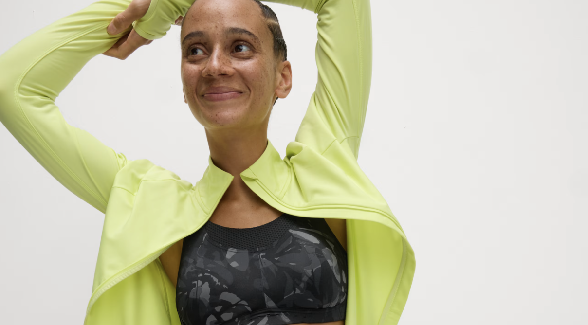 A person wearing a lime green jacket