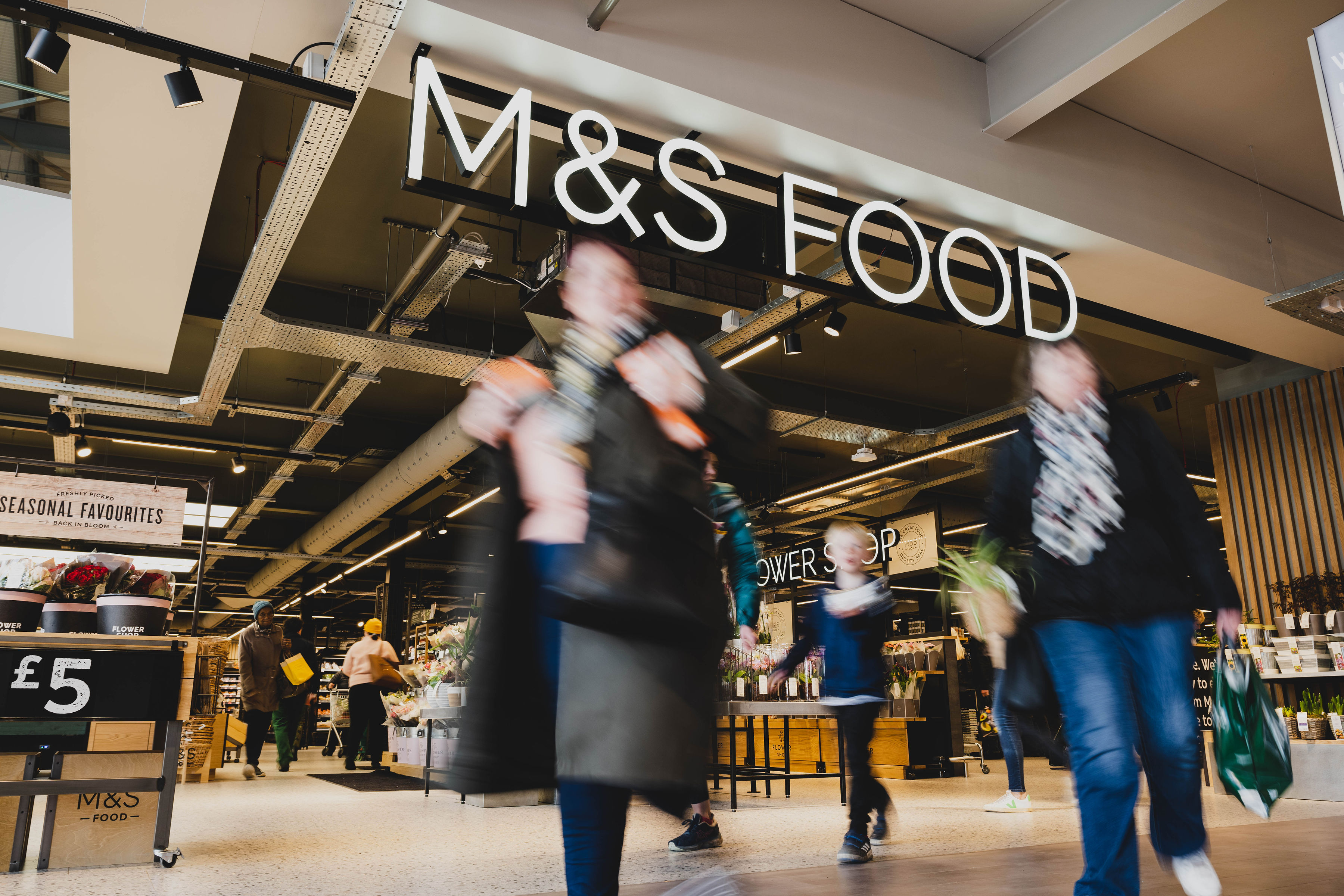 M&S Food shop, customers walking 