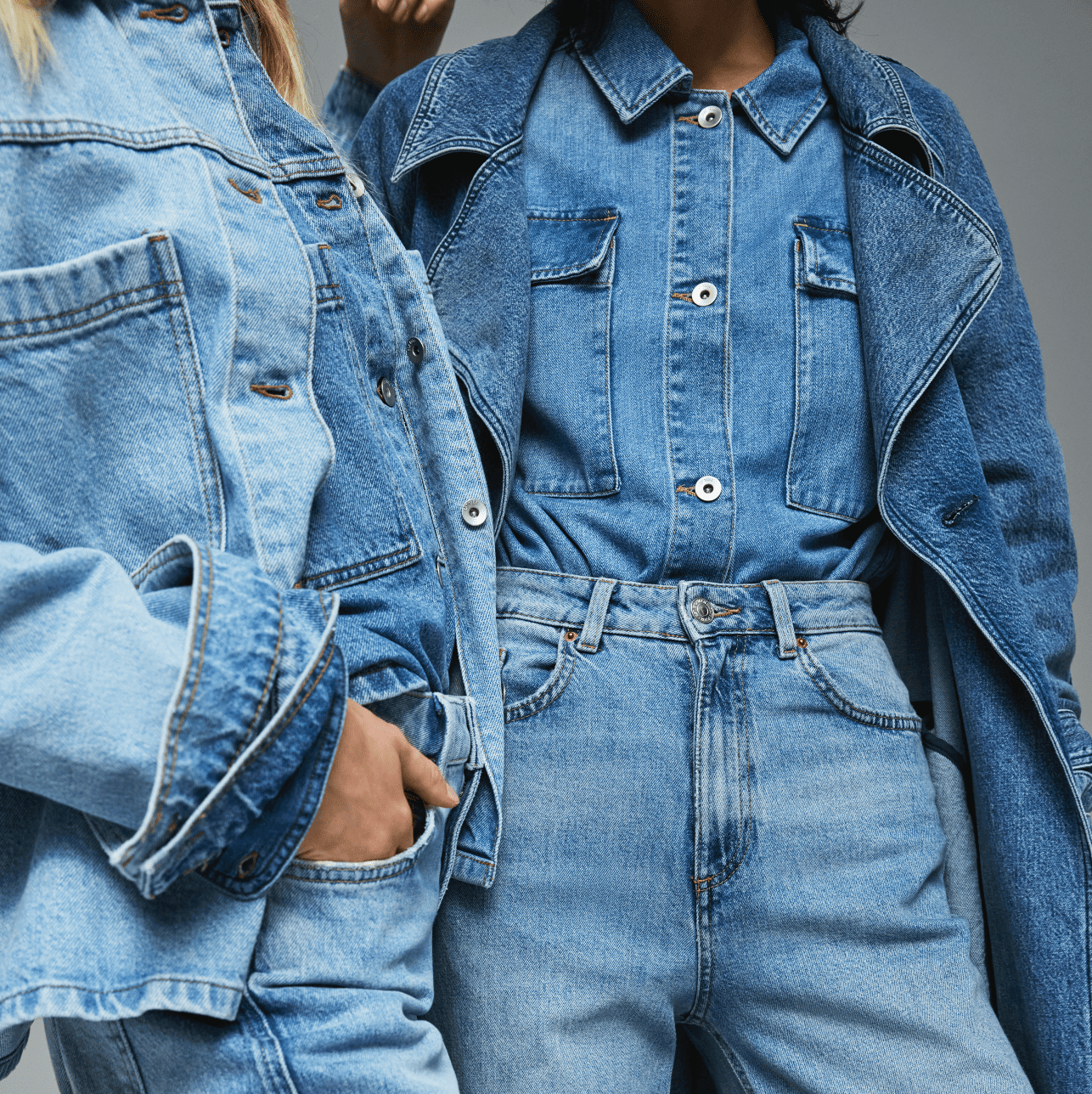 Two people wearing outfits that are all denim