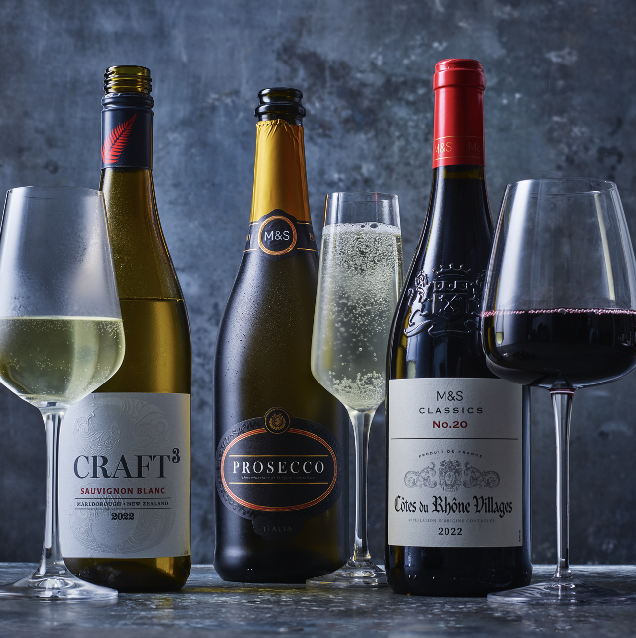 A selection of wine in bottles and glasses